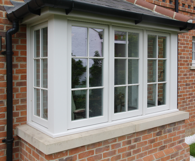 Edwardian square bay window with deep mouldings