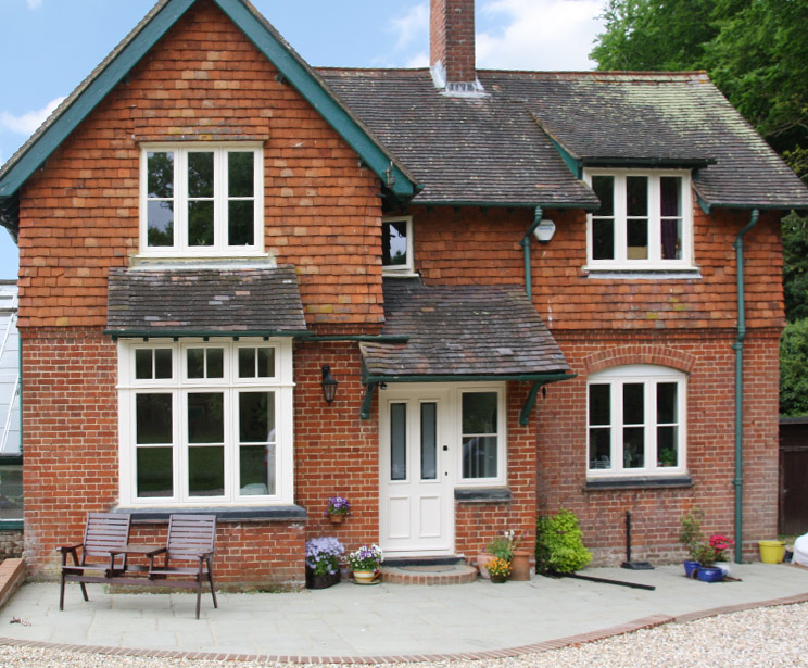 Replacement timber Flush Casement windows in Cottage Style for this rustic cottage in Dorking, Surrey