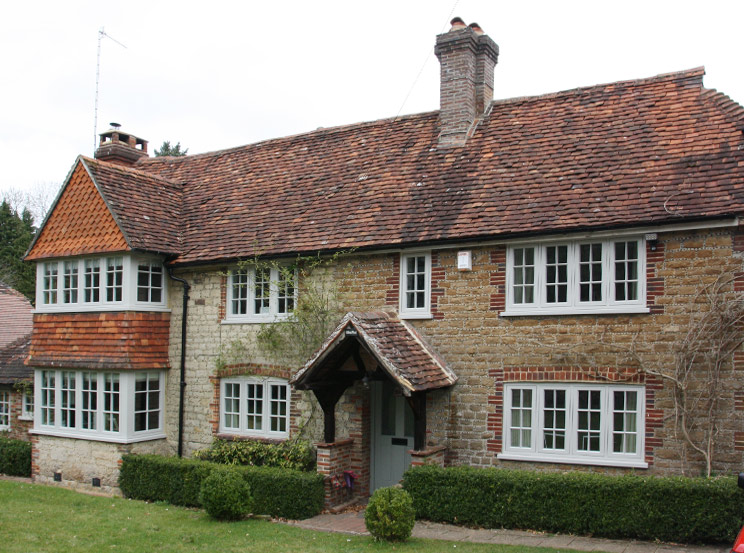 Replacement and new Flush timber casement windows and doors for this 1920’s cottage in Leigh, Surrey Hill