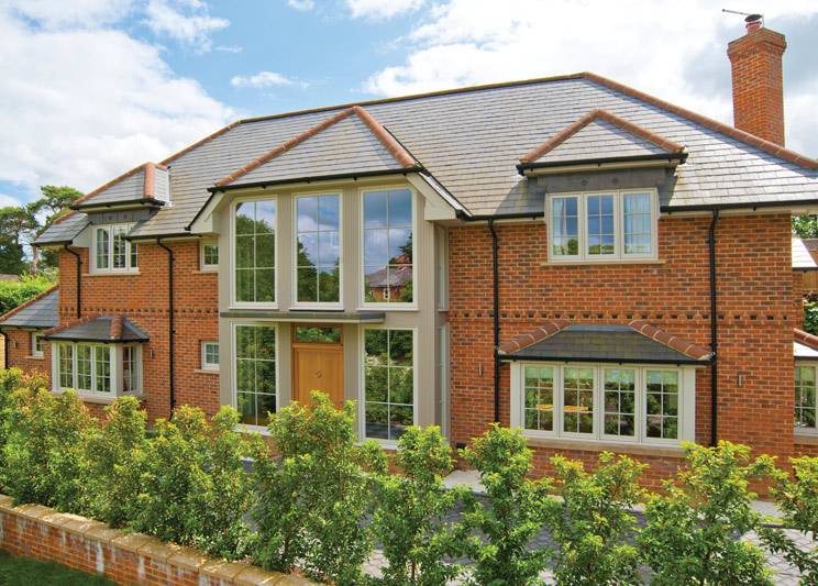 Recessed Edwardian timber casement windows and doors for this unexampled new build Home in Traditional design in Farnham, Surrey