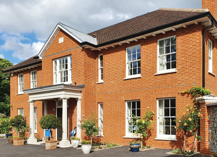 Slimline Georgian design timber sash windows for this chic newbuild home in Ascot, Berkshire