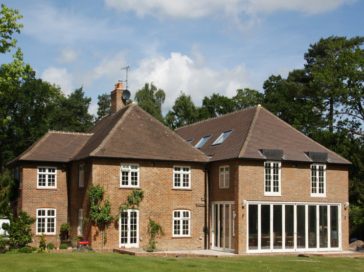 New and replacement Flush timber casement windows and bifold doors for this elegant country house in Reigate, Surrey