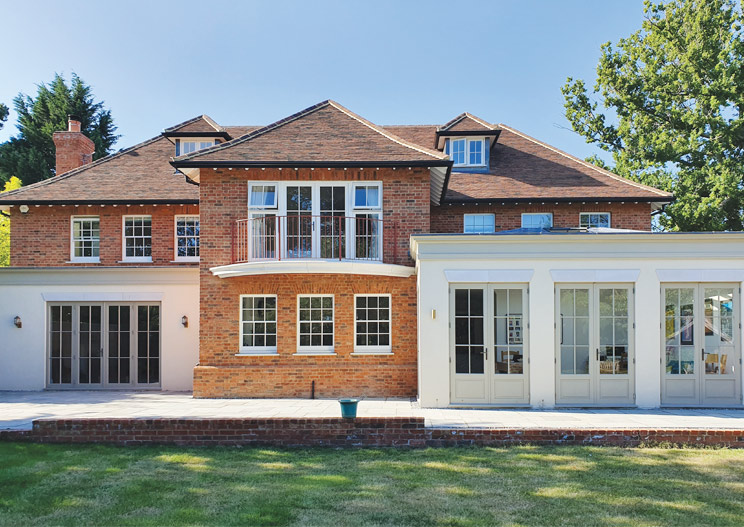 Slimline Flush Casement windows with elegant French doors for this newbuild Arts & Crafts House in Godalming, Surrey