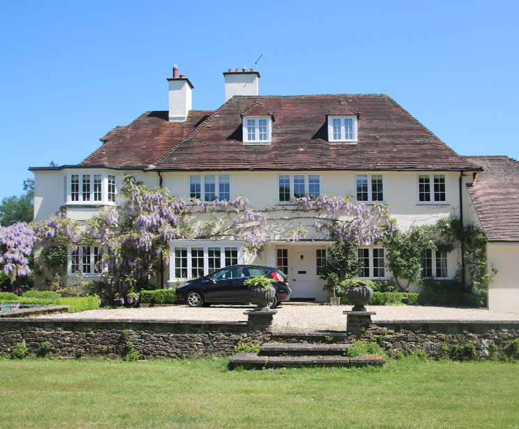 Timber Flush casement windows and doors for this stunning 1930’s country house in Shamley Green, Surrey