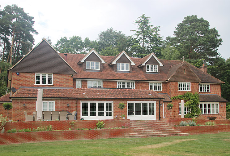 Recessed Casement timber windows, French & Bifold Doors for this grand and elevated Country House in Sunninghill, Berkshire