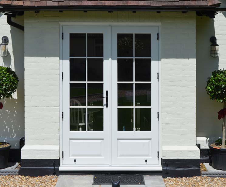 Double French Doors with period panels and glazing bars